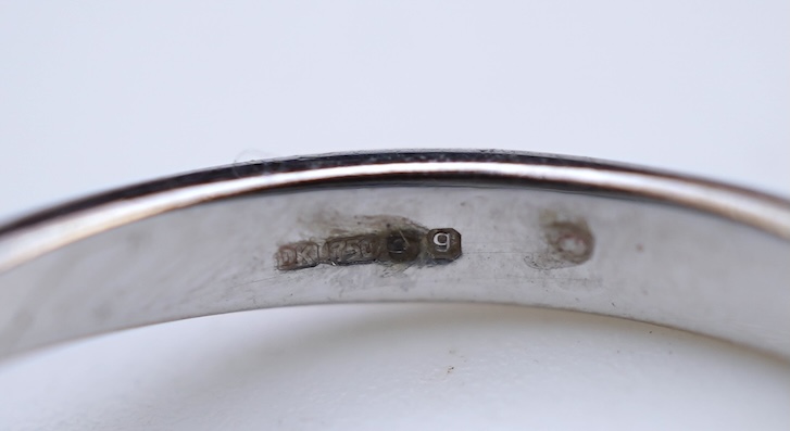 An aquamarine and diamond ring